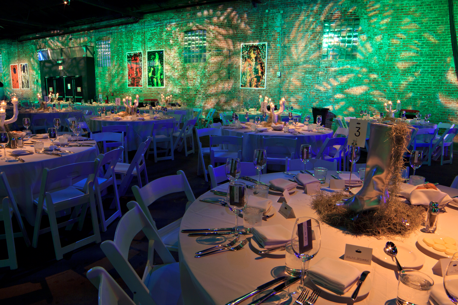 Prospect3 Non Profit Gala green lighting with tablescape