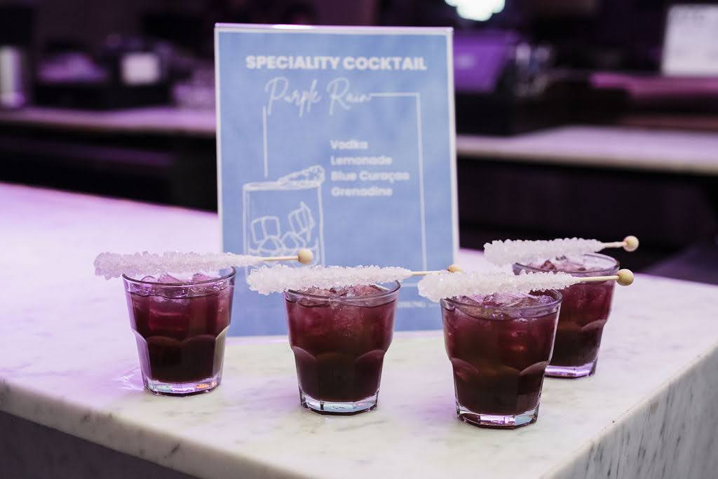 Purple rain specialty cocktails for hyosung innovue launch in new orleans.